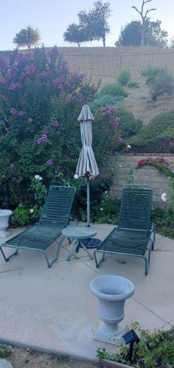 2 Chaise Lounge Chairs, Umbrella, Table