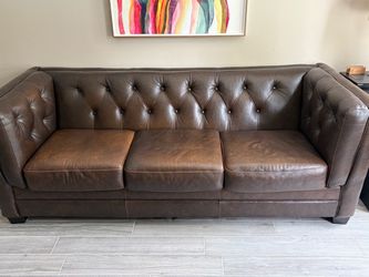 Ashley Tufted Genuine Leather Sofa – Dark Brown – $750 OBO