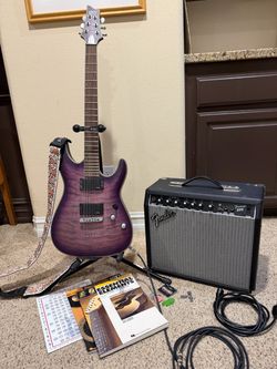 12 pc Guitar set, Guitar, Amp, Cords, Books, etc
