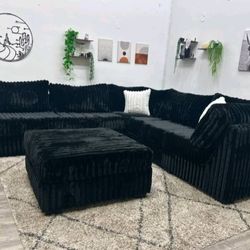 Beautiful sectional couch with matching ottoman