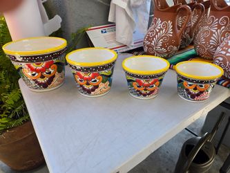 Set de cuatro macetas a ($ 65)