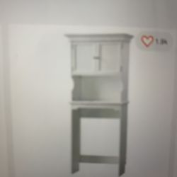 Over the toilet storage cabinet. White. Brand new, never used