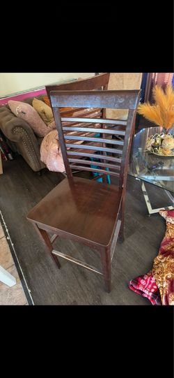 4 brown chairs