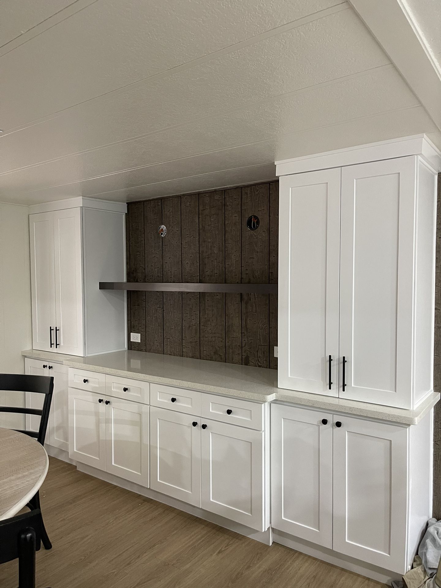 Floating Shelve And White Shakers Cabinets
