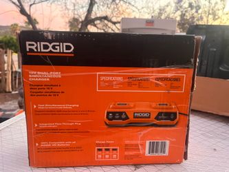 To the 18V RIDGID dual-port simultaneous fast charger (Model AC86095).