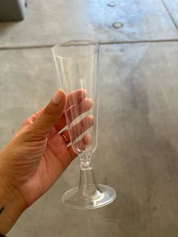 Dozen of plastic champagne flutes