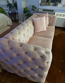 Pink two seater sofa