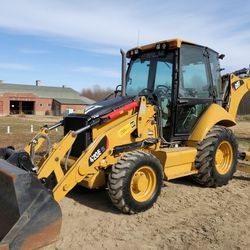11 Caterpillar 420E