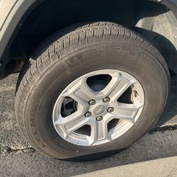 tires and Jeep original rims