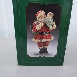 Santa hugs and kisses
Fabriche KsA Collectibles 

