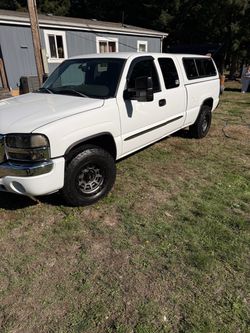 White GMC Sierra Crew Cab Pickup Truck