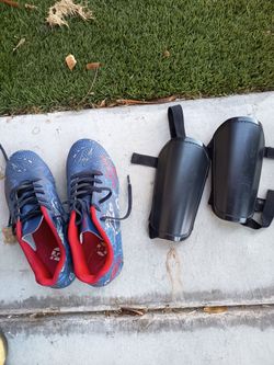 Soccer shoes/ cleats with shin pads
