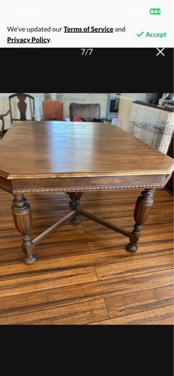 Antique dining room table with chairs