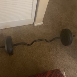 Curl Bar With 10 Pound And 15 Weights