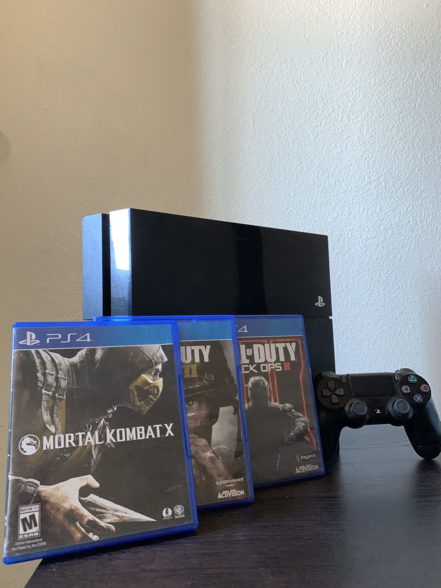 PS4 w/ Controller + 3 Games