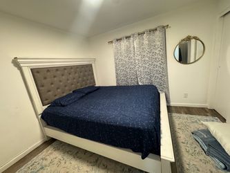 King size bed frame only.