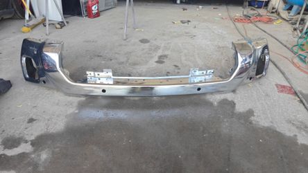 Sierra GMC front bumper cover  w / sensor holes