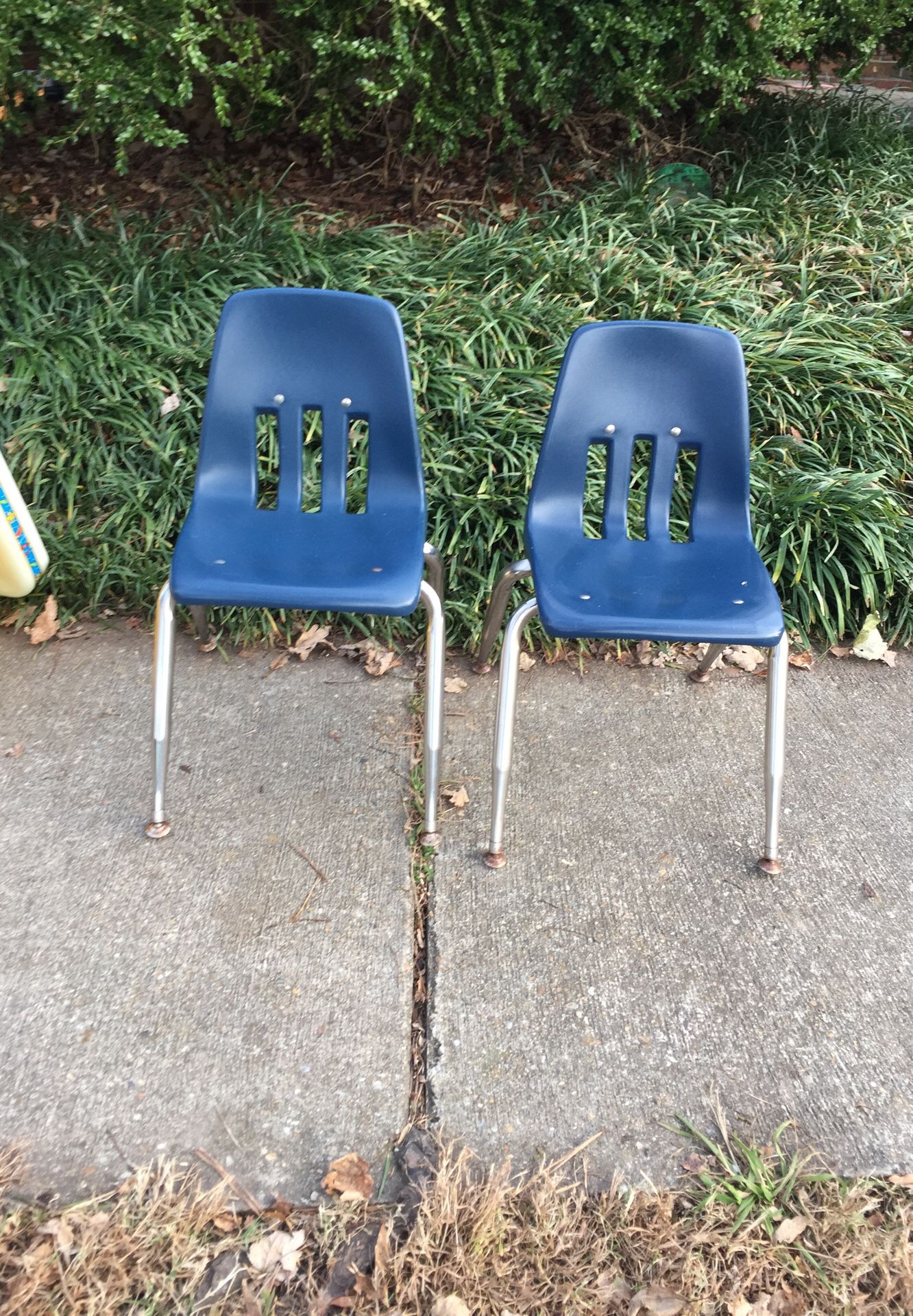 2 blue kids chairs