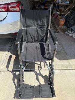 Black Folding Transport Wheelchair with Footrests