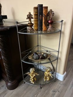 Iron& glass table((Height 36”, width 20”, depth 14”)