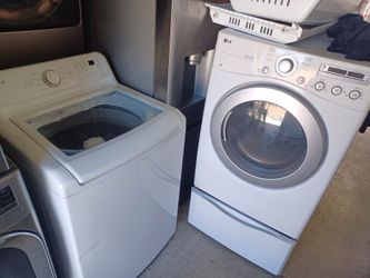 Lg Top load Washer and gas dryer