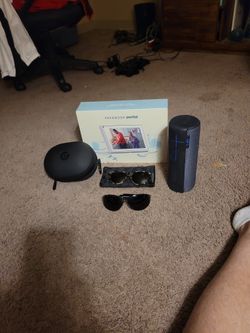 Home Electronics And A Couple Pair Of Sunglasses