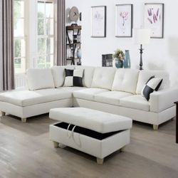 White Leather sectional Couch And Ottoman 