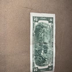 Two dollar bill only selling $50 never used in perfect condition and ships with plastic wrap and box