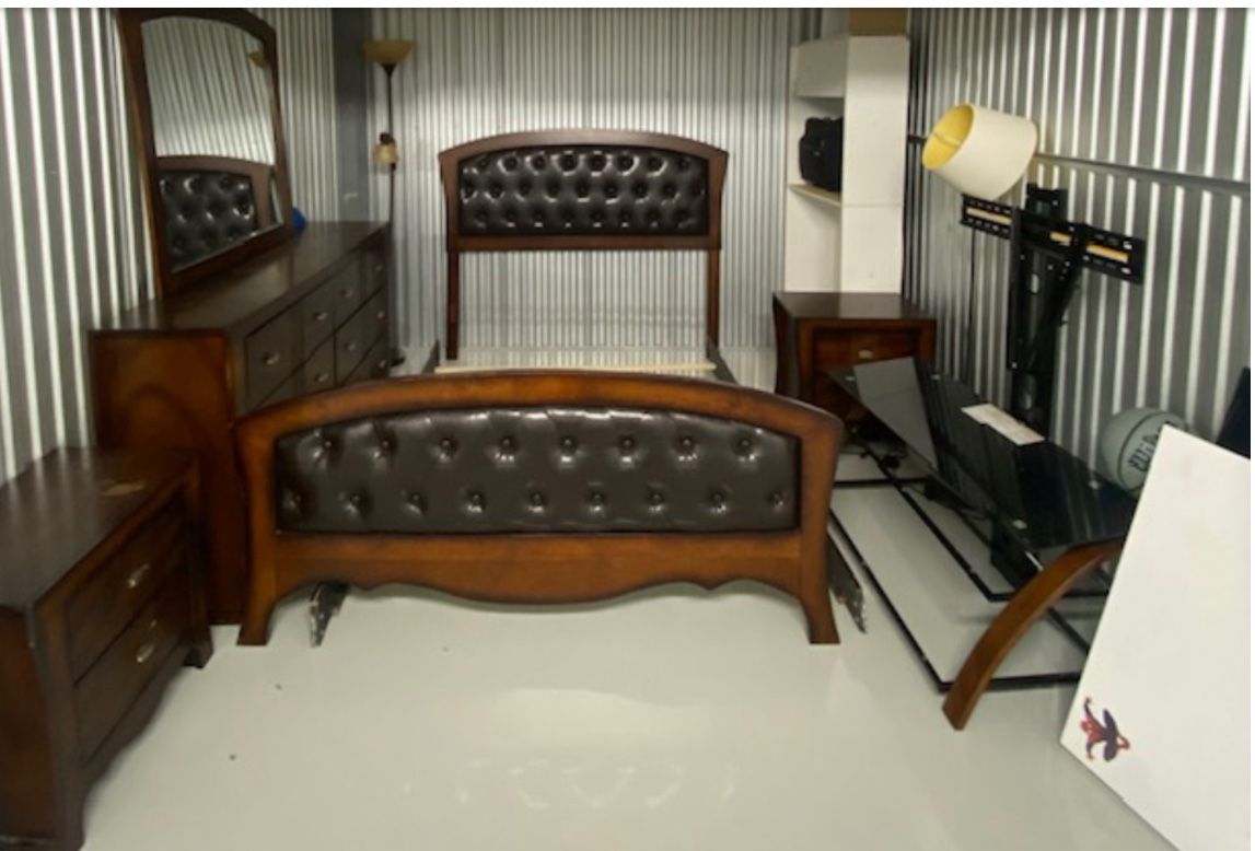 Cherry Wood and Leather Headboard/Foot board with Slats. Matching Dresser and Mirror. 2 Matching Nightstands. Glass Top TV Stand. @ Standing Lamps