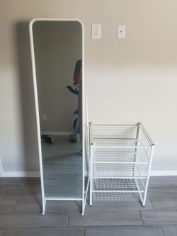 Mirror and storage racks