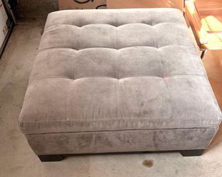 Gray ottoman with storage