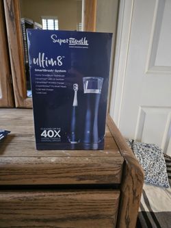 NEW Electric Toothbrush + UV Sanitizer – $85 OBO