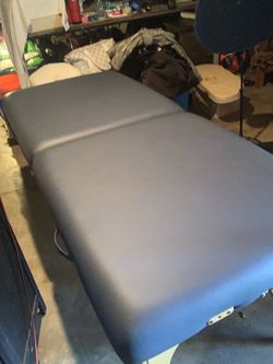 Massage table
