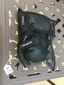 Brand new kids razor knee pads and elbows pads