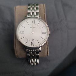  Fossil Woman's Jacquline ES3433 Three hand date Stainless Steel Quartz Watch With A Silver Tone Dial