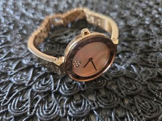 MOVADO ROSE GOLD TONE WATCH.