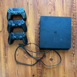 PS4 PlayStation 4 Slim 1TB with 3 Controllers, 14 games