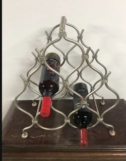 Metal wine rack. Holds 8 bottles