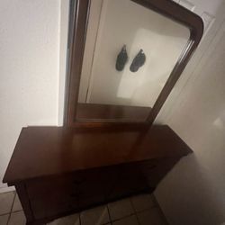 Brownish Reddish Dresser With Mirror 
