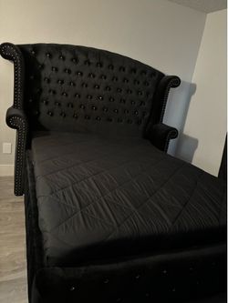 Black upholstered bed frame, dresser and night stand