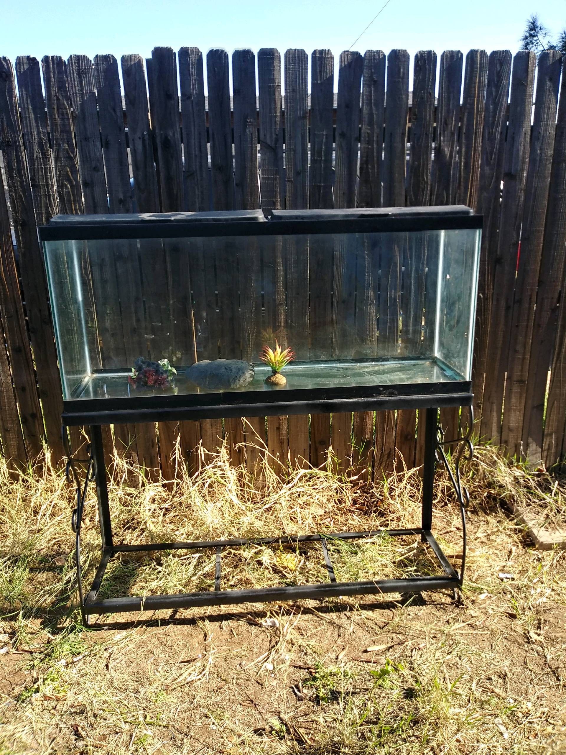 Like new. 55gal fish tank $80 lid no lights some decorations als0