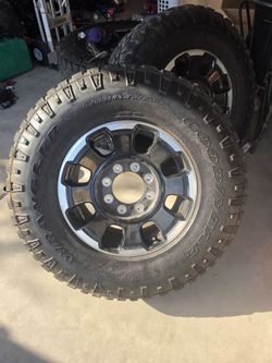 18" OEM Ford F-250/F-350 Tremor wheels mounted on Goodyear Wrangler DuraTrac tires (size LT285/75R18, which measures out to roughly 35 inches).