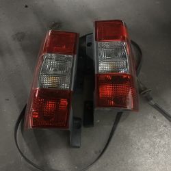 2014 Nissan 1500 NV Headlights Taillights Grill