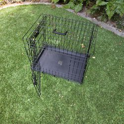 Small foldable dog crate - like new