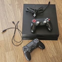Sony PlayStation 4 with 2 Controllers