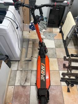 EMOVE Cruiser V2 – 60V dual motor Quad Suspension 62-Mile Long-Range Electric Scooter