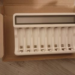 Battery Charger Brand New 7$