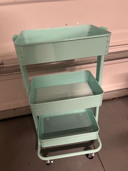 Teal rolling cart