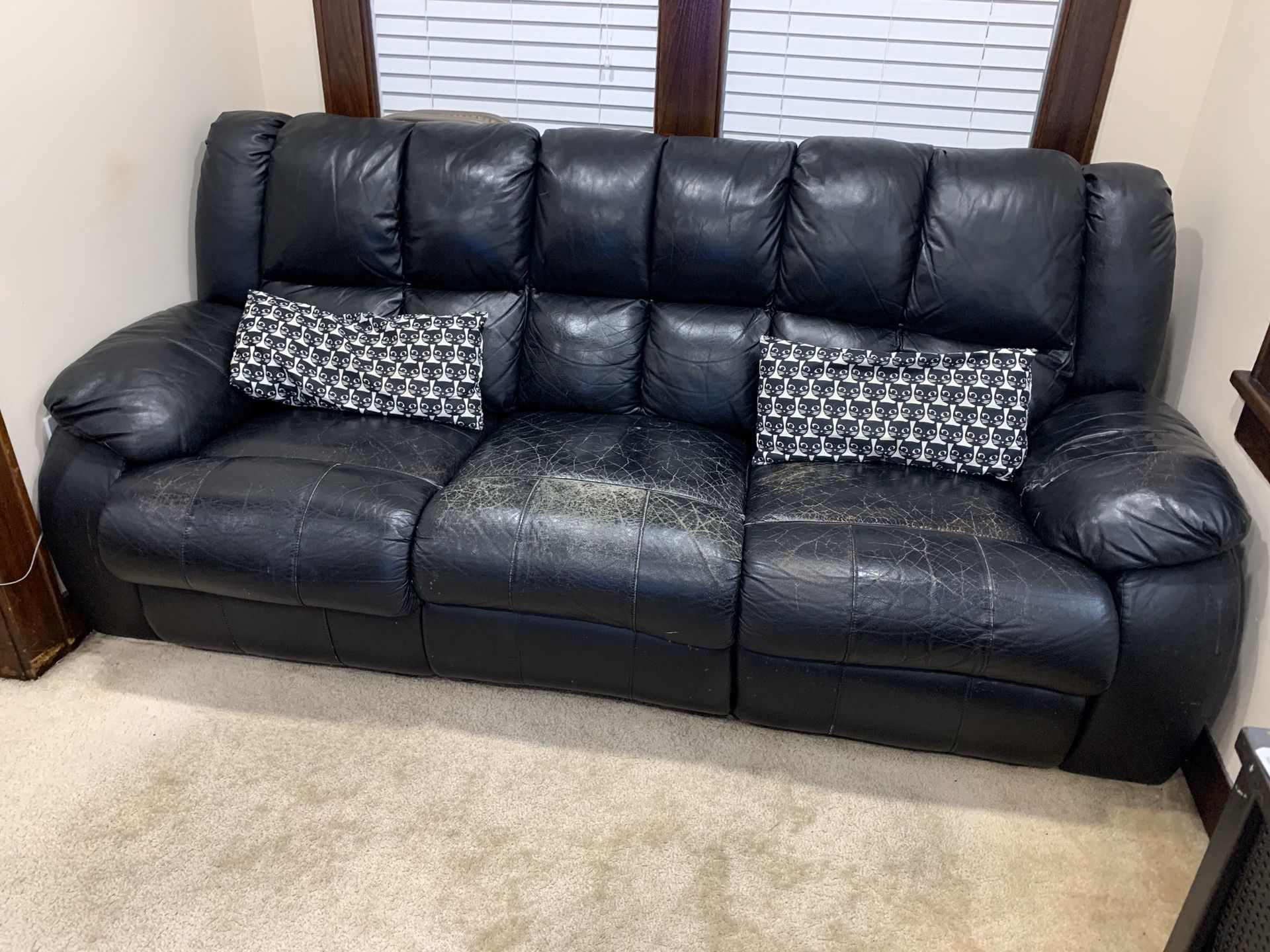 Free leather couch. Still reclines. Leather is cracking and has some tears. But has served the family well.