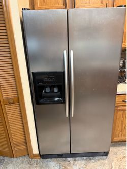 kitchenAid stainless steel side-by-side refrigerator not cooling